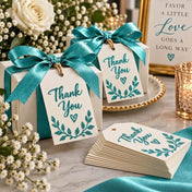 Gift boxes and thank you tags decorated with turquoise glitter lettering and bows - thumbnail number 6