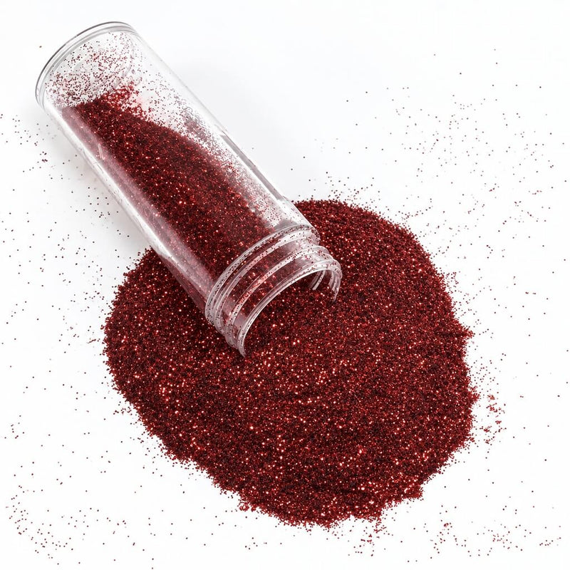 Metallic burgundy extra fine glitter powder pouring from a small jar onto a white surface - thumbnail number 2