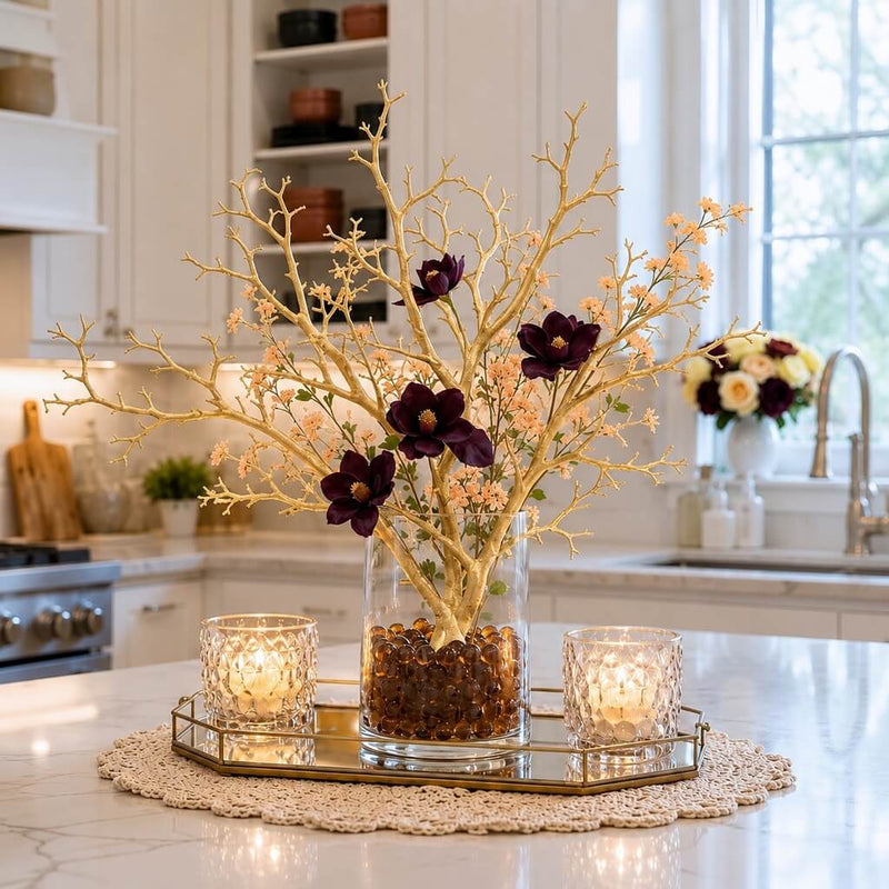 Metallic gold artificial manzanita tree branches arranged with dark flowers in a glass vase - thumbnail number 7