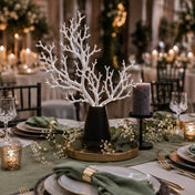 White artificial manzanita tree branch centerpiece in a black vase on a formal table - thumbnail number 3