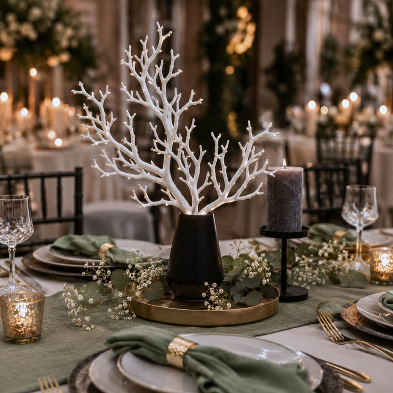 White artificial manzanita tree branch centerpiece in a black vase on a formal table - thumbnail number 3