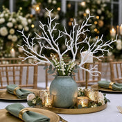 White artificial manzanita tree branches arranged in a vase as a centerpiece on a formal table - thumbnail number 6