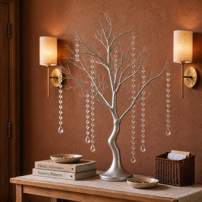 Metallic silver manzanita tree centerpiece with acrylic bead chains on a wooden console table - thumbnail number 7