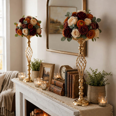 Gold metal pillar candle holders with floral arrangements on mantel - thumbnail number 7