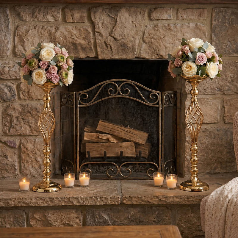 Tall gold twisted stem candle holders with floral balls on stone hearth - thumbnail number 8