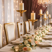 Gold and clear acrylic pillar candle stands styled with white and peach floral centerpieces - thumbnail number 7