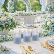 Six blue candles in Frosted Votive Holders on a wedding table setup with flowers - thumbnail number 5