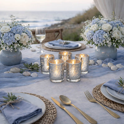 Five burning Metallic Silver Mercury Votive Holder pieces setup on an oceanfront dinner table - thumbnail number 7