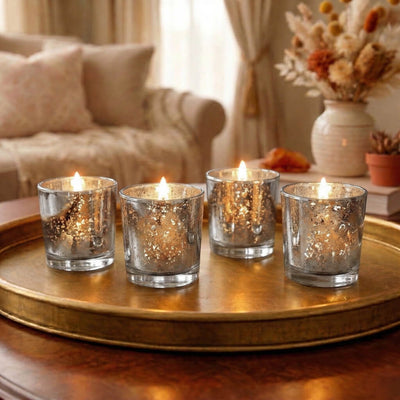 Cozy living room coffee table display with warm Votive Candles & Mercury Votive Holders lit - thumbnail number 8