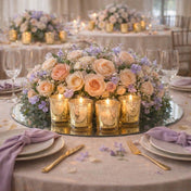 Gold mercury glass votive candles with pastel floral centerpiece on elegant event table - thumbnail number 7
