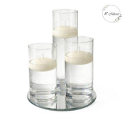 Eastland Round Mirror and Cylinder Vase Centerpiece with Richland 3" Floating Candles Set of 7 - thumbnail number 71