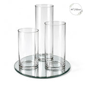 Three empty glass cylinder vases arranged on a ten-inch round mirror tray - thumbnail number 1