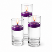 Three purple floating candles burning inside tall clear glass vases - thumbnail number 2