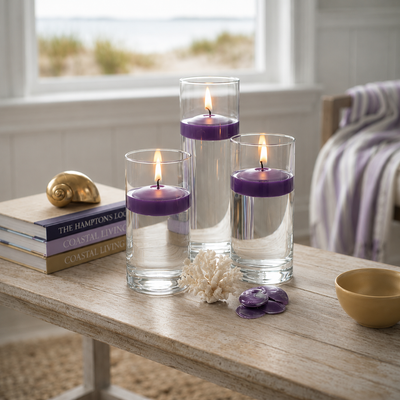 Three purple floating candles in glass cylinders on a wooden coffee table - thumbnail number 5