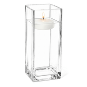 A lit floating white candle in the Square Vase 12" isolated on a solid white background - thumbnail number 3