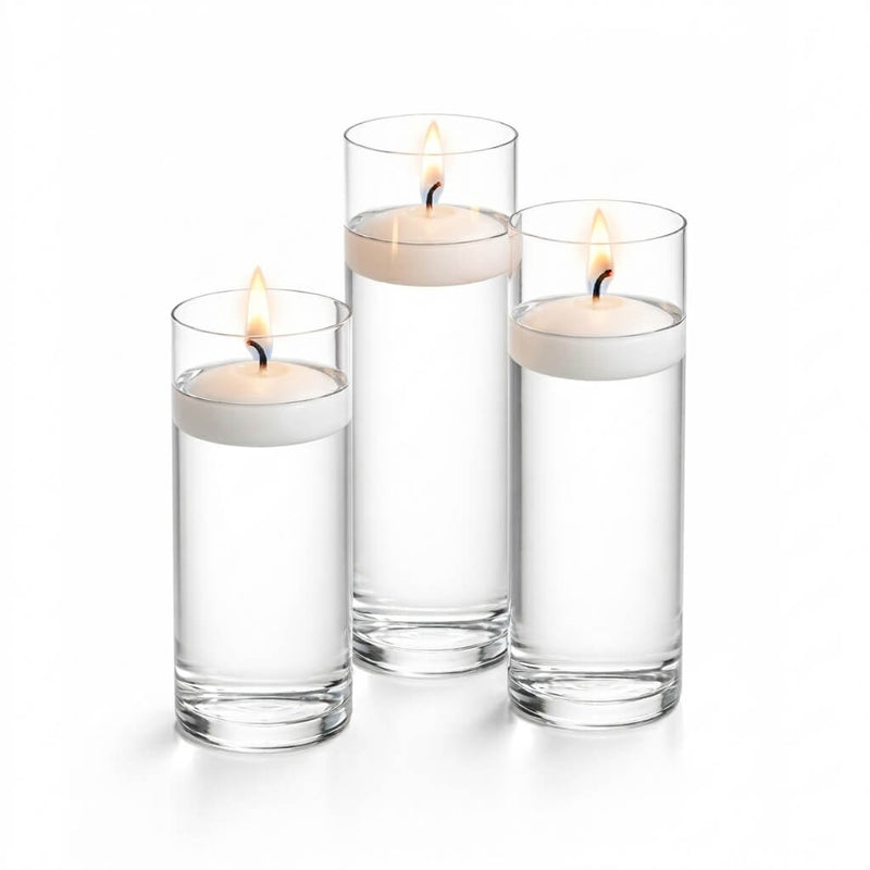 Three white floating candles in tall glass cylinders - thumbnail number 2