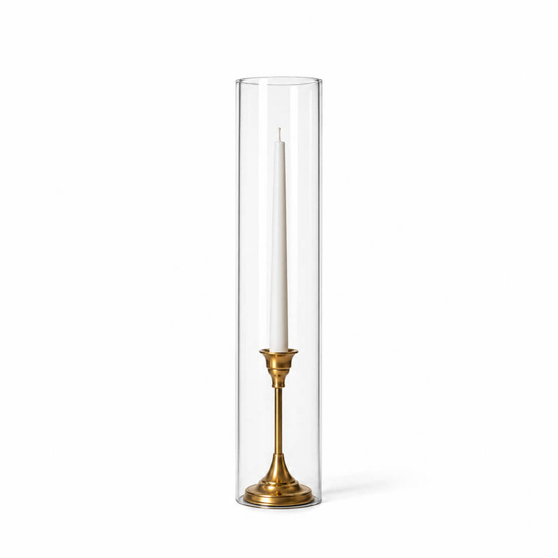 A white taper in a gold holder with a 4" x 18" chimney glass candle shade - thumbnail number 2