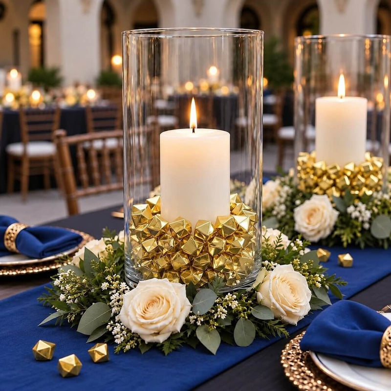 Tall glass cylinder candle holder filled with gold acrylic ice beads, surrounded by roses - thumbnail number 5