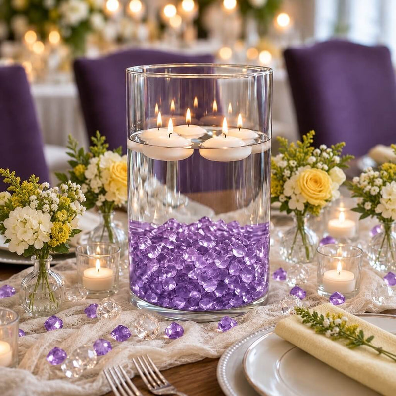 Floating candles in a glass cylinder with purple acrylic ice beads on a table setup - thumbnail number 4