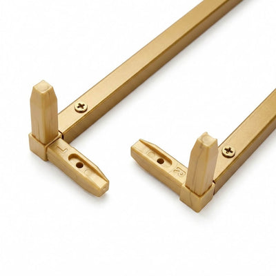 Close-up of gold metal frame corners with L and R marked plastic connectors - thumbnail number 3