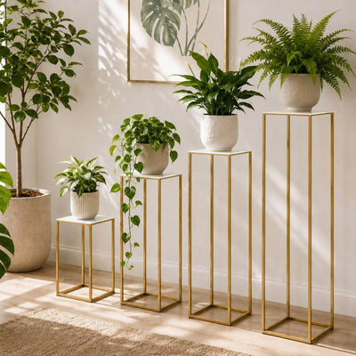 Four gold metal stands with white acrylic tops and potted plants of varying heights - thumbnail number 10