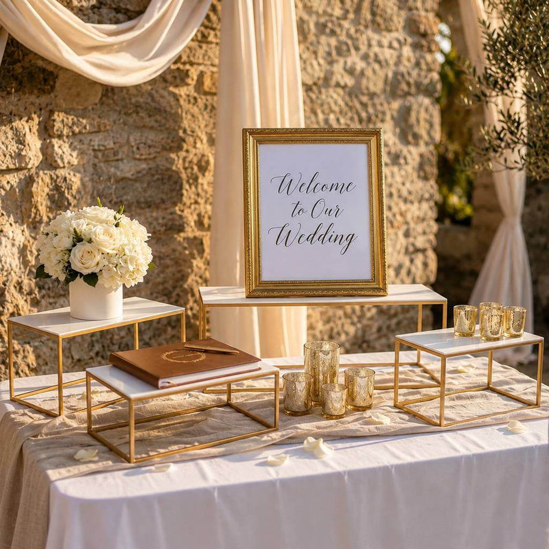 White rectangular acrylic display stands with gold frames on a wedding welcome table - thumbnail number 4