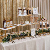White rectangular acrylic display stands with gold frames on a coffee bar table - thumbnail number 6