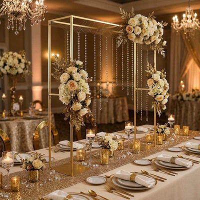Gold arch stand over a wedding table, decorated with flowers and hanging crystals - thumbnail number 5