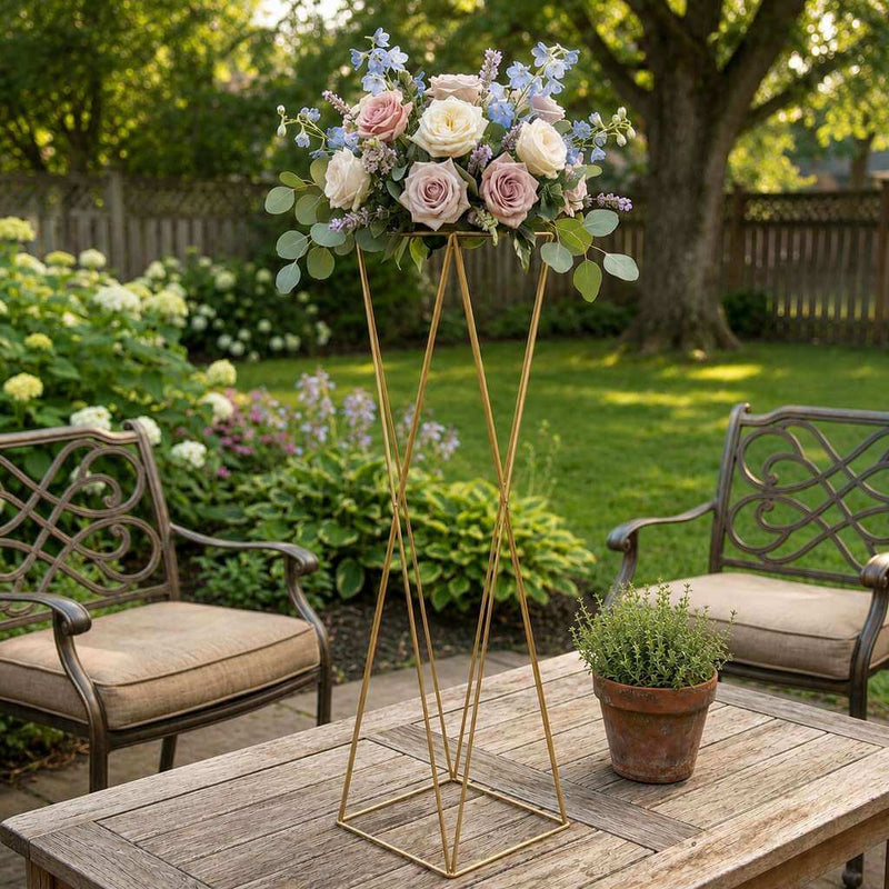 Tall gold geometric stand with floral arrangement on backyard table - thumbnail number 8