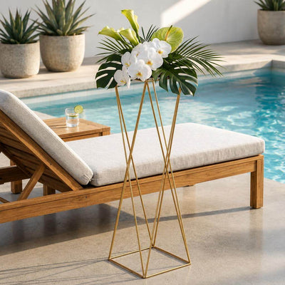 Tall gold geometric pedestal stand with orchids near pool - thumbnail number 10