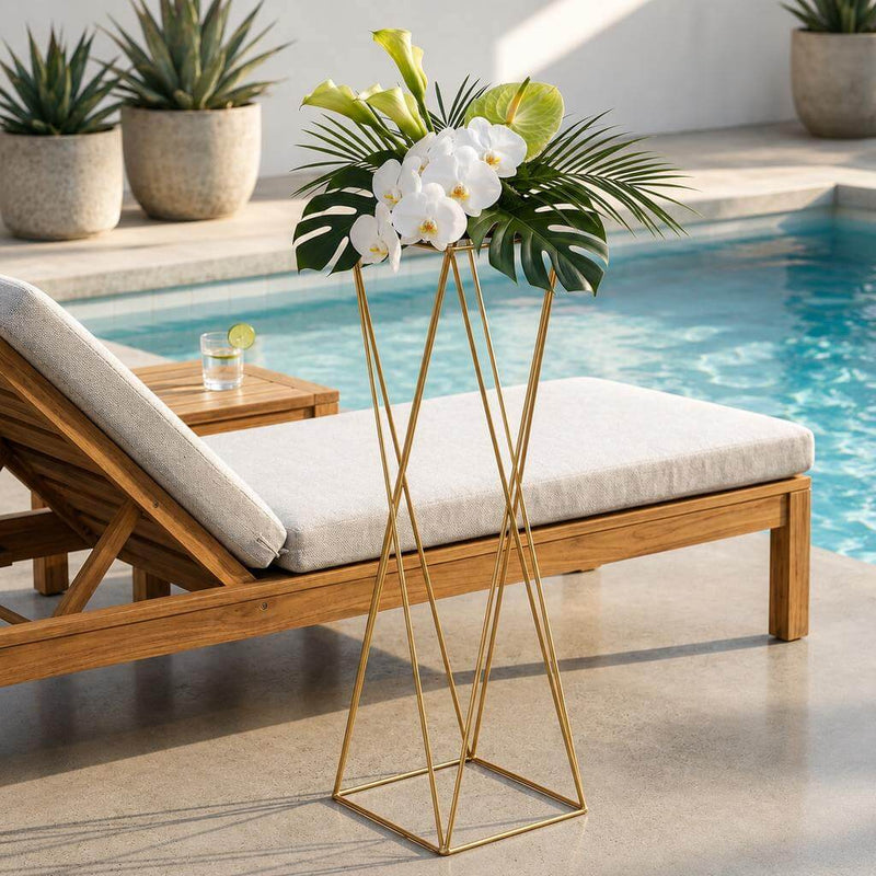 Tall gold geometric pedestal stand with orchids near pool - thumbnail number 10