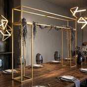 Gold metal over-table frame decorated with hanging purple florals - thumbnail number 7