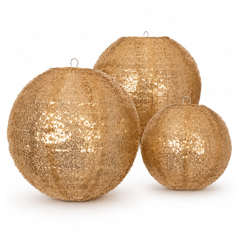 Three round gold sequin sphere decorations of different sizes on a white background - thumbnail number 1