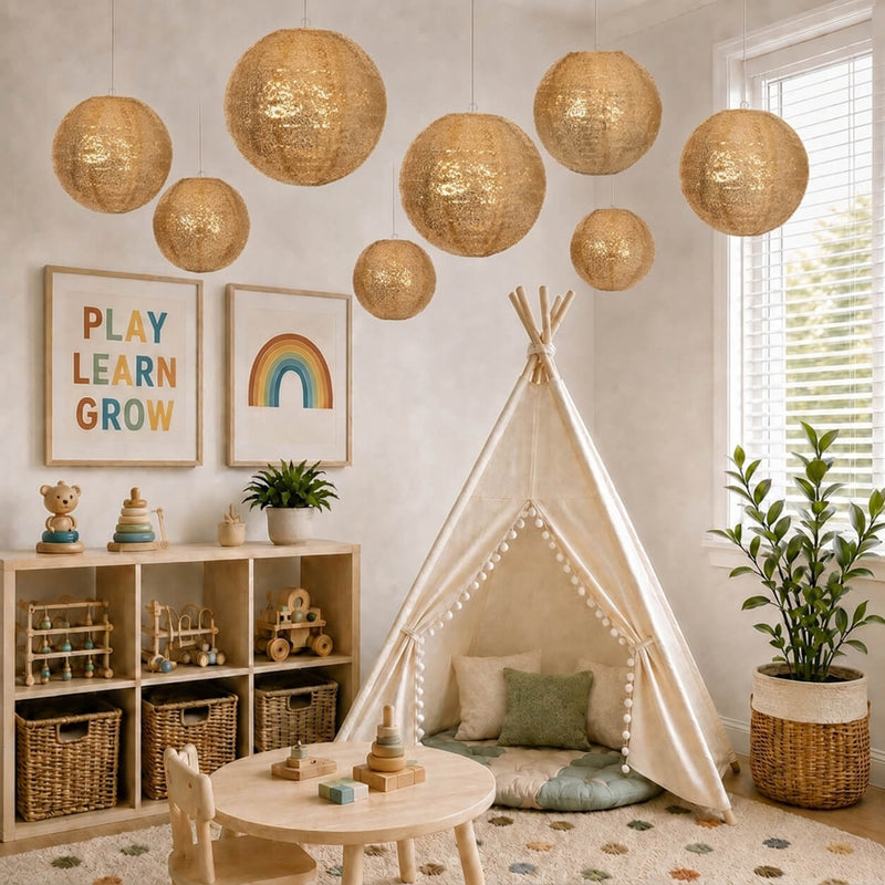 Hanging gold sequin lanterns decorating a child's playroom with a teepee - thumbnail number 8