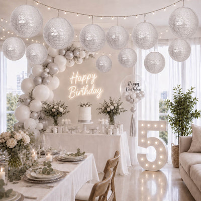 Silver sequin hanging lanterns decorating a birthday party setup - thumbnail number 2