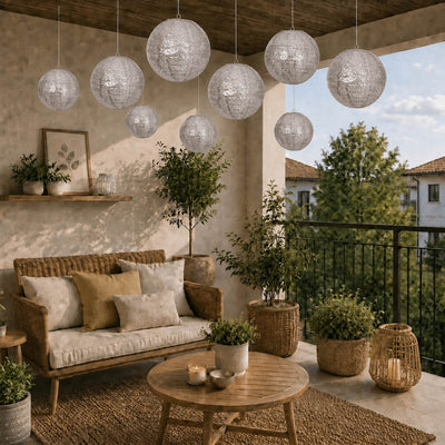 Group of shimmering silver sequin hanging lanterns suspended on a boho balcony - thumbnail number 8