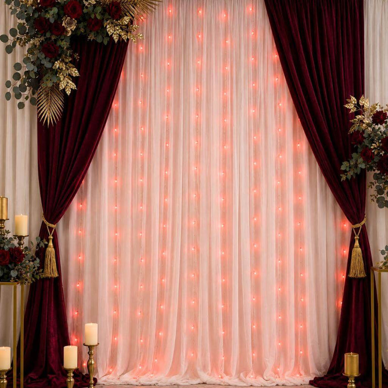 20 red LED starry fairy string lights hanging against a backdrop with deep red curtains - thumbnail number 7