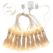 Lit 1200 warm white LED curtain string lights, 10ft x 40ft, with controller on white background - thumbnail number 1