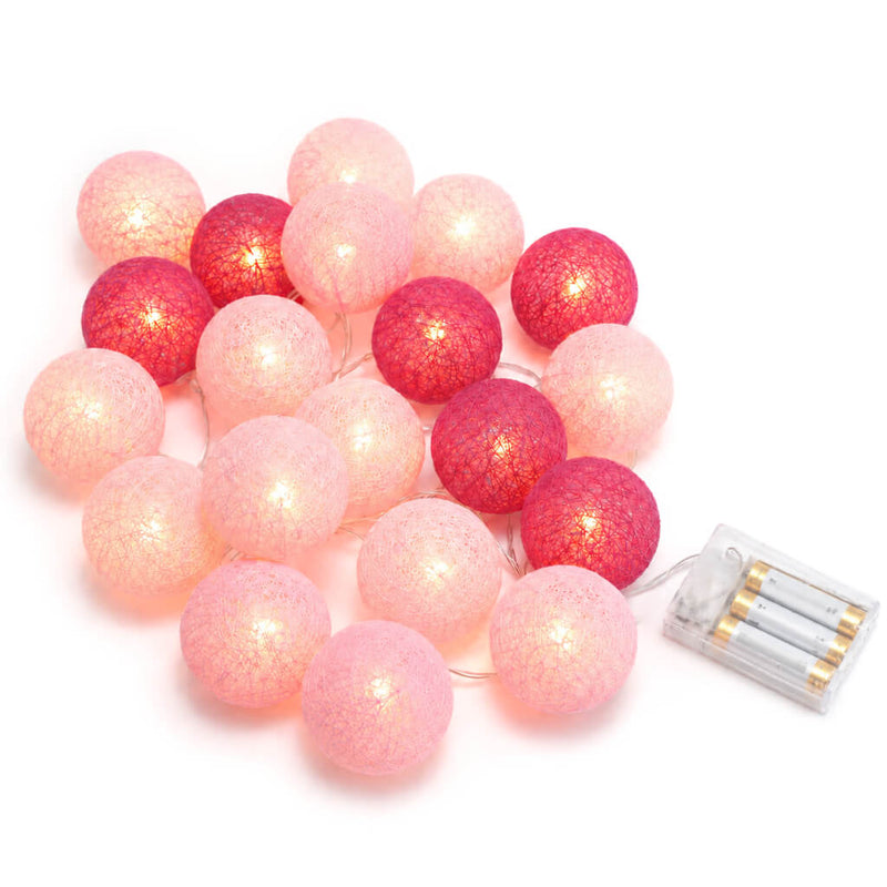Pink and fuchsia LED cotton ball string lights with battery pack on a white background - thumbnail number 2