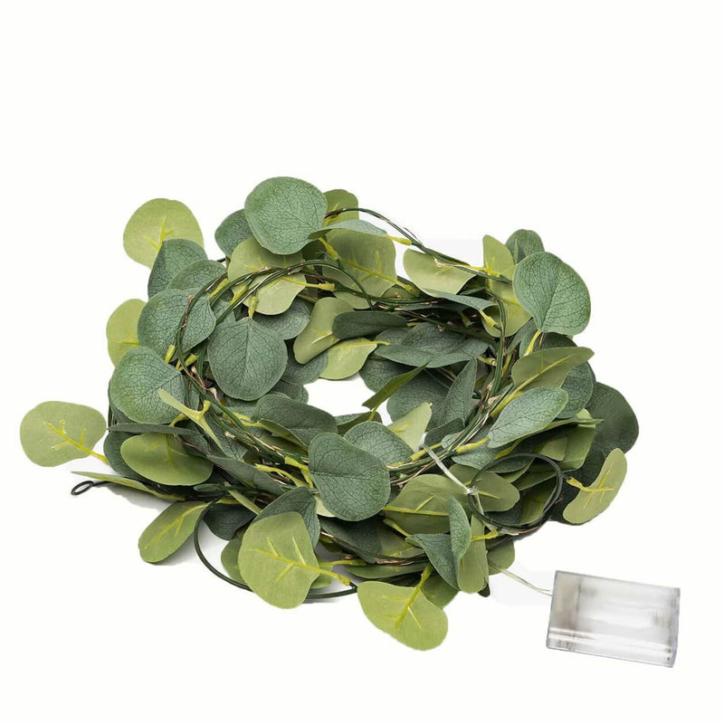 Coiled green eucalyptus leaf garland string lights with a battery box - thumbnail number 1