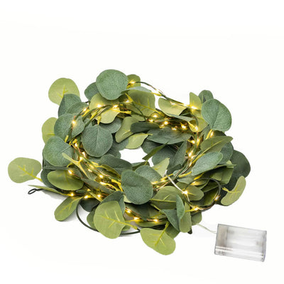 A battery-operated eucalyptus leaf garland with warm white LED string lights on a white background - thumbnail number 2
