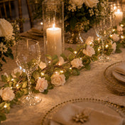 Rose and light garland as a table centerpiece with candles - thumbnail number 4