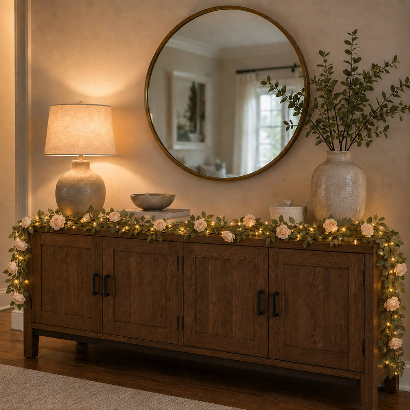Rose and light garland draped across a wooden console table - thumbnail number 9