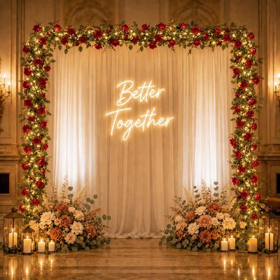 A 7ft red silk rose flower garland with 20 LED string lights framing a wedding backdrop - thumbnail number 5