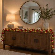 A 7ft red silk rose flower garland with 20 LED string lights draped on a wooden console table - thumbnail number 7