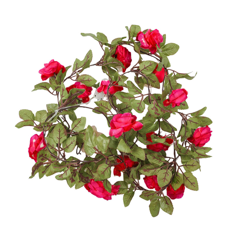 A 7ft red silk rose flower garland with green leaves bundled on a white background - thumbnail number 1