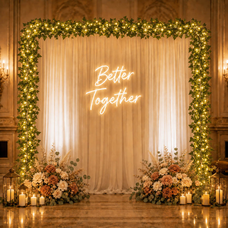 Ivy garland string lights framing a wedding backdrop with a neon sign - thumbnail number 6