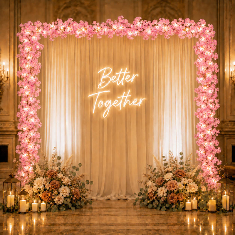Pink cherry blossom LED garland framing wedding backdrop - thumbnail number 5