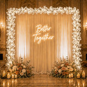 Cherry blossom garland string lights framing a wedding backdrop with a neon sign - thumbnail number 7