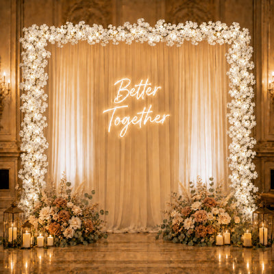 Cherry blossom garland string lights framing a wedding backdrop with a neon sign - thumbnail number 7
